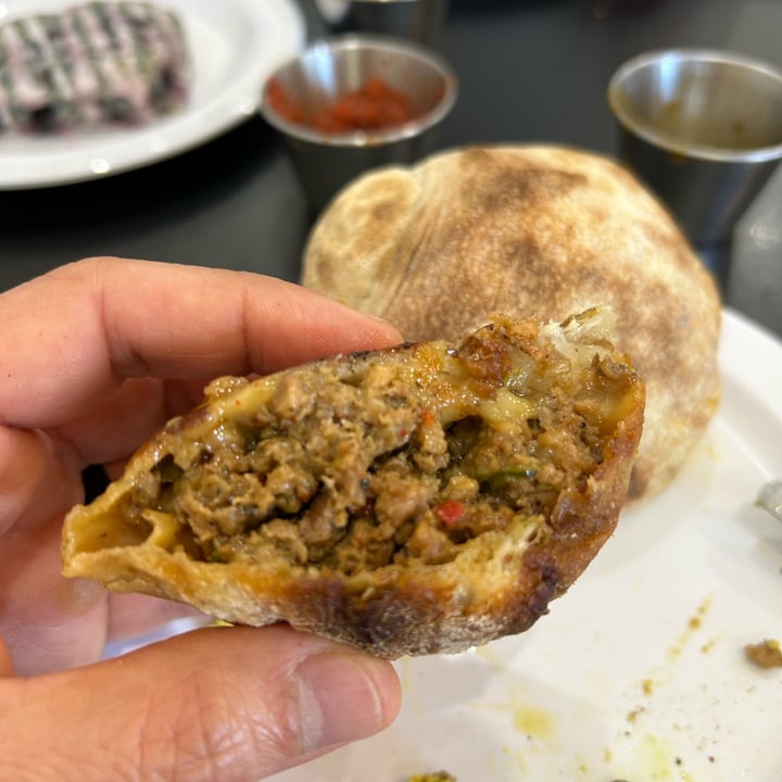photo of Community Grounds: Coffee & Meeting House Cheese, Seitan Pepperoni, and Mushroom Calzone shared by @wisecamel86 on  13 Apr 2024 - review