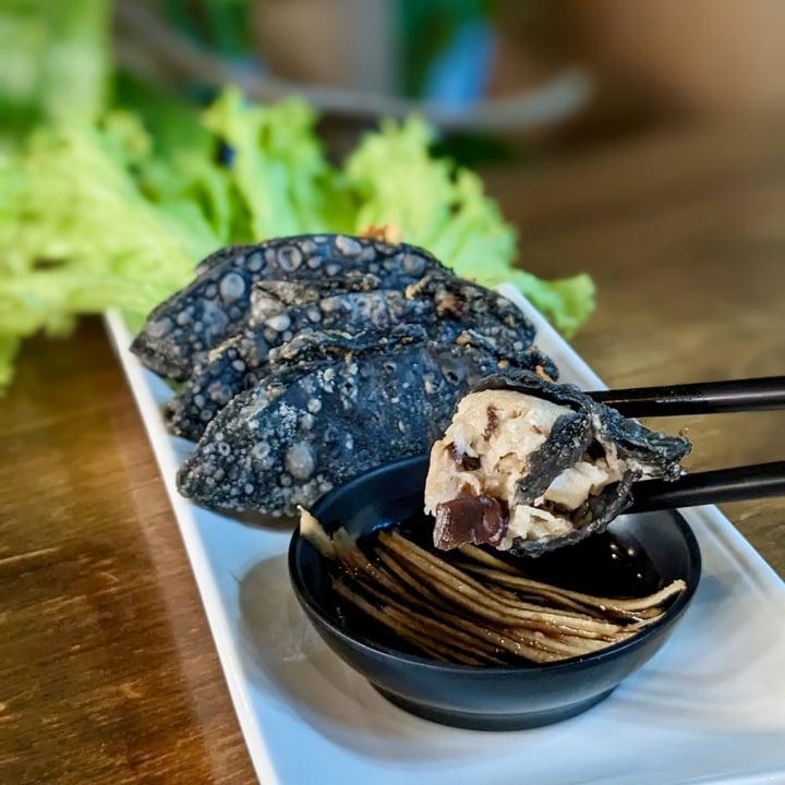 photo of nomVnom Bistro Charcoal Truffle Gyoza with Black Vinegar Ginger Dip shared by @xinru-t on  18 Sep 2023 - review