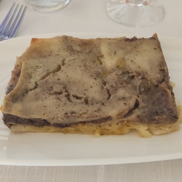 Photo of the dish “Lasagna Alle Cipolle E Crema Di Legumi”