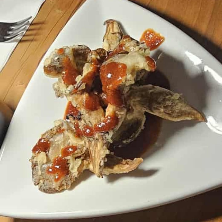 photo of Village of OM Plant Kitchen Village Spicy Fried Blue Oyster Mushrooms shared by @veghui on  07 Sep 2025 - review