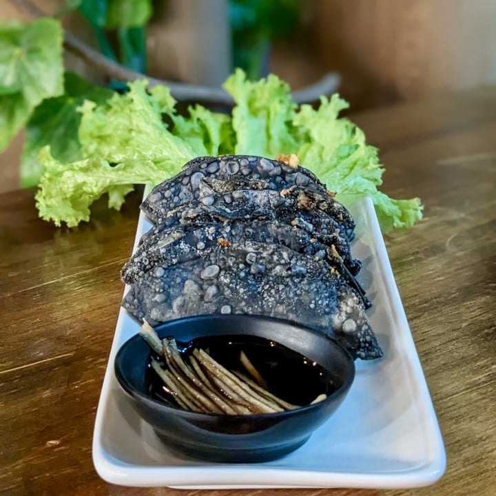 photo of nomVnom Bistro Charcoal Truffle Gyoza with Black Vinegar Ginger Dip shared by @xinru-t on  18 Sep 2023 - review