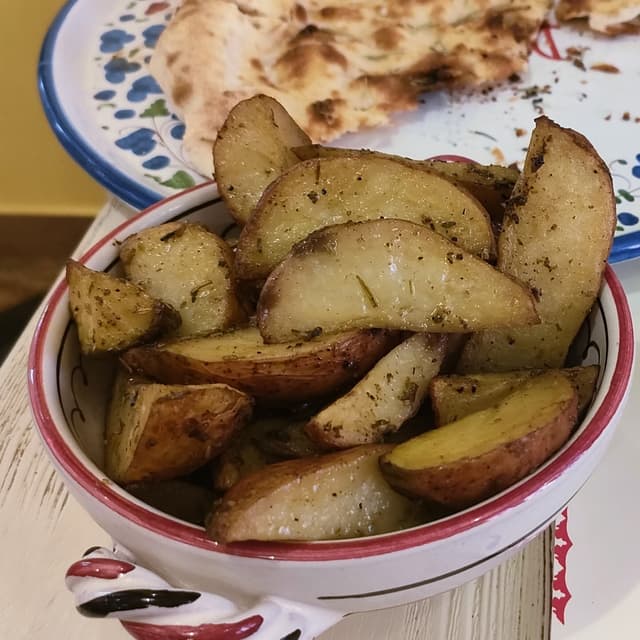 Photo of the dish “Patate al Forno (Veganizzate)”