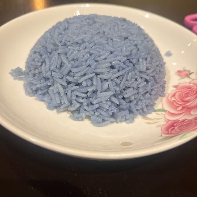 Photo of the dish “blue pea coconut rice”