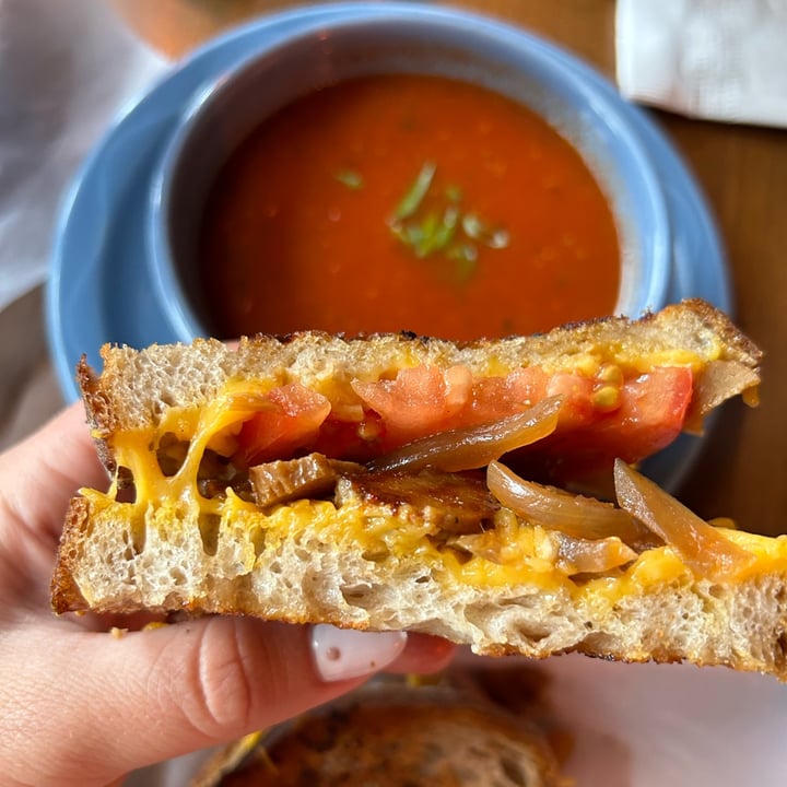 photo of All Souls Lounge Vegan grilled cheese with seitan, caramelized onions, & tomato soup shared by @ginanicole on  15 Aug 2023 - review
