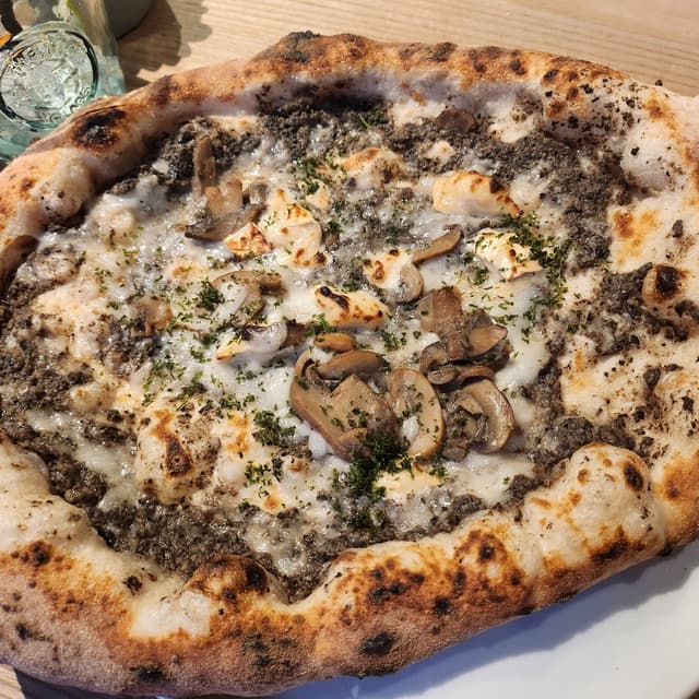 Photo of the dish “Black Truffle Pizza”