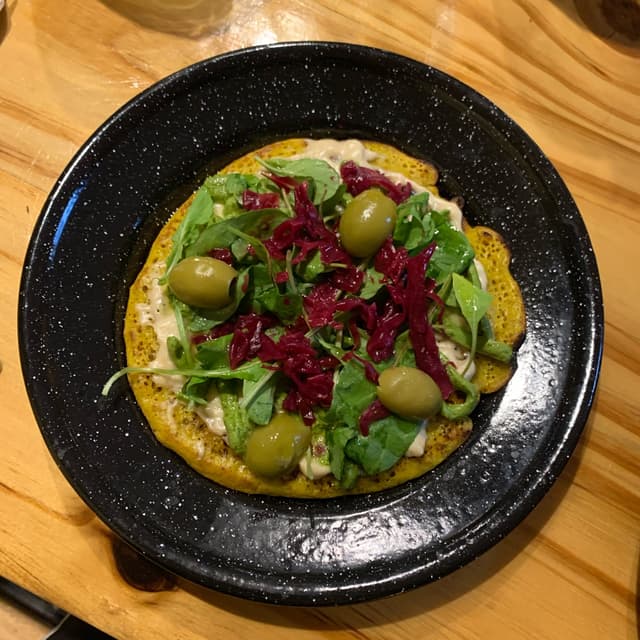Photo of the dish “Pizzeta de yamaní y cúrcuma”