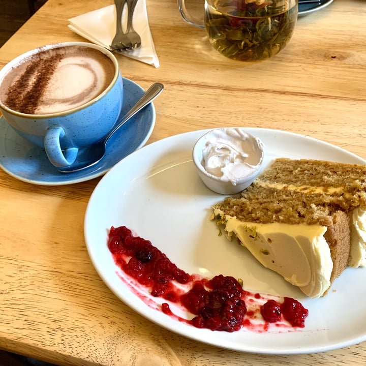 photo of Goji Cafe Vegetarian Cafe & Deli Pistachio And Cardamom Cake With Coconut Cream shared by @vegpledge on  18 Feb 2023 - review