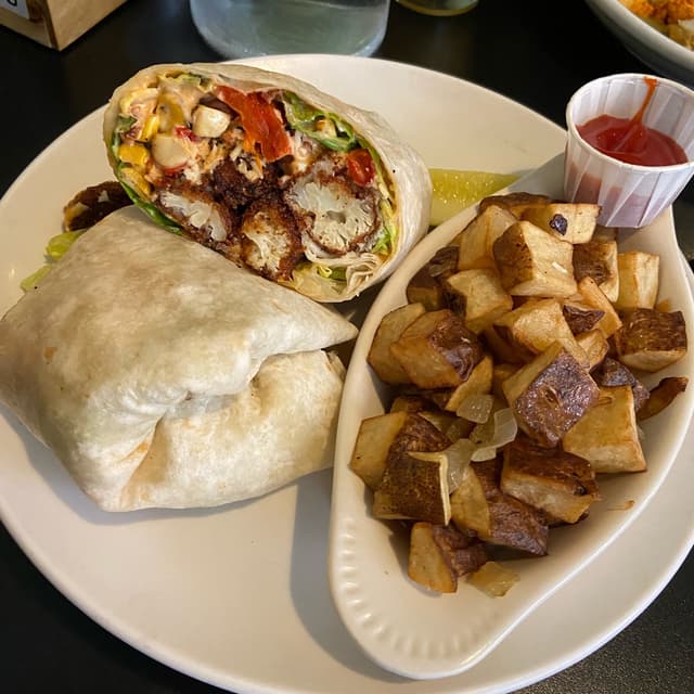 Photo of the dish “cauliflower crunch wrap”