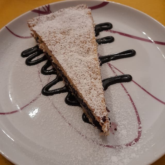 Photo of the dish “crostata alle nocciole con marmellata di mirtilli”