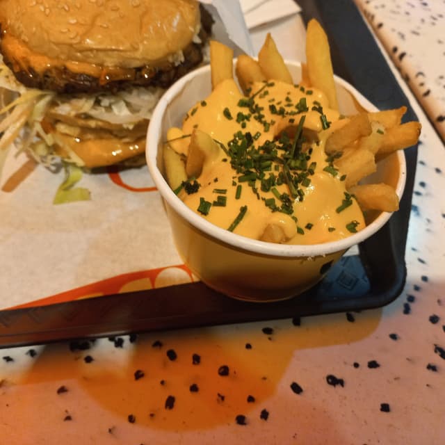 Photo of the dish “papa con cheddar”