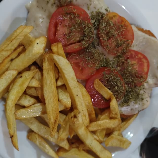 Photo of the dish “Lomito con Jamón y papas fritas”