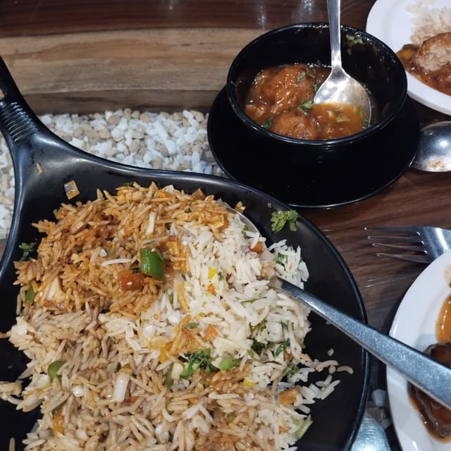 Triple Schezwan fried rice at Rootage Restaurant And Bar Lounge ...