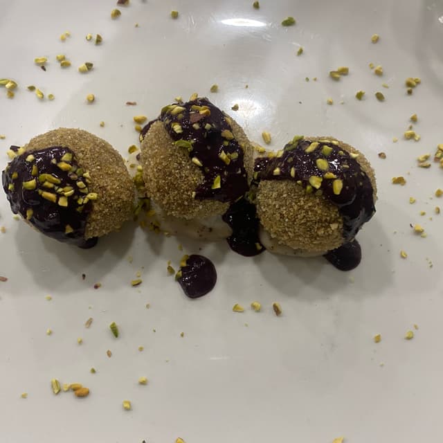 Photo of the dish “Polpette Con Riduzione di More, Cacio E Pepe E Pistacchi”