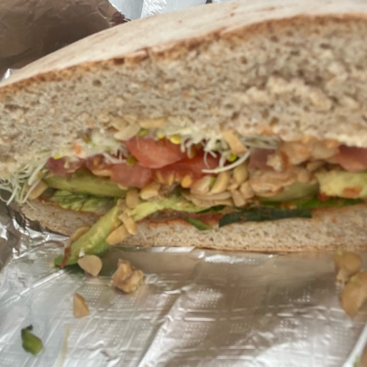 photo of Peace Cafe Cilantro Hummus Sandwich shared by @carrieannburns on  27 Feb 2023 - review