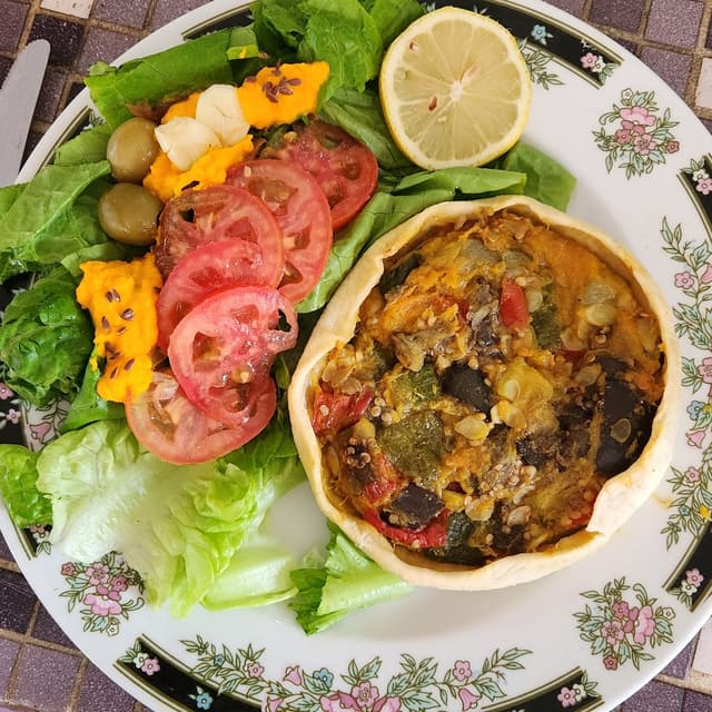 Photo of the dish “Tarta De Verduras Con Ensalada”