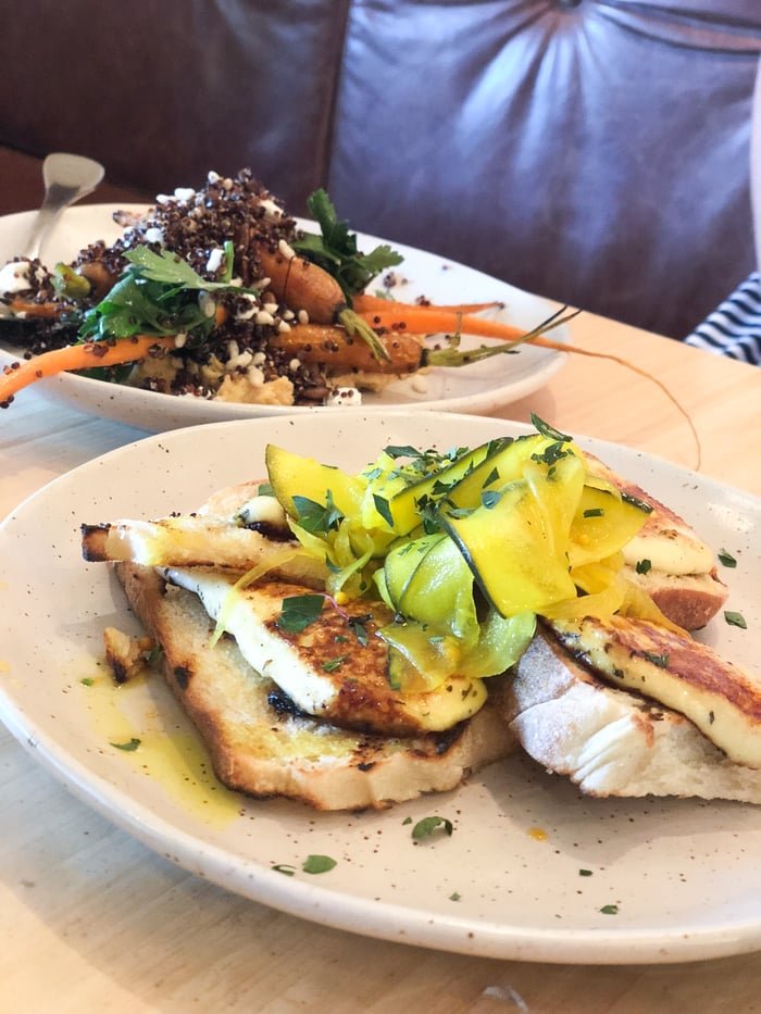 Halloumi on toast with quinoa and roasted veg salad