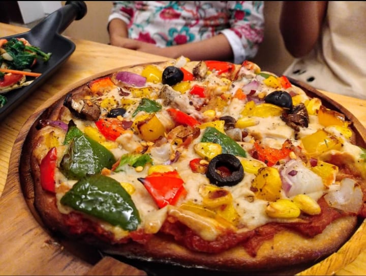 photo of Ubuntu Community - The Vegan Cafe Cheese Veggies Pizza shared by @swarnaliroy58 on  14 Mar 2020 - review