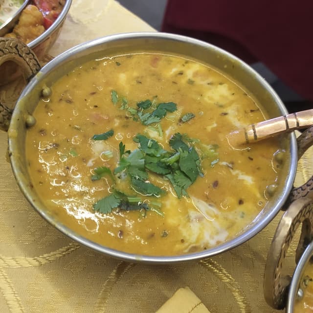 Photo of the dish “Dal Di Lenticchie Gialle In Salsa Piccante E Cumino”