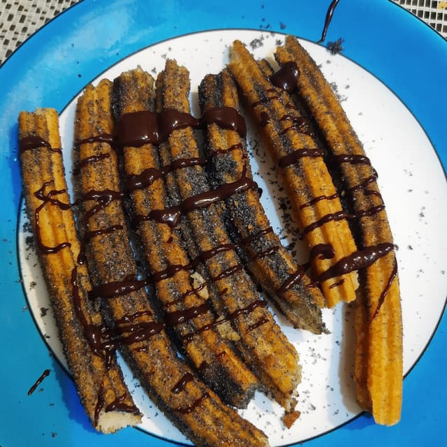 Foto do prato “Churros pan de muerto”