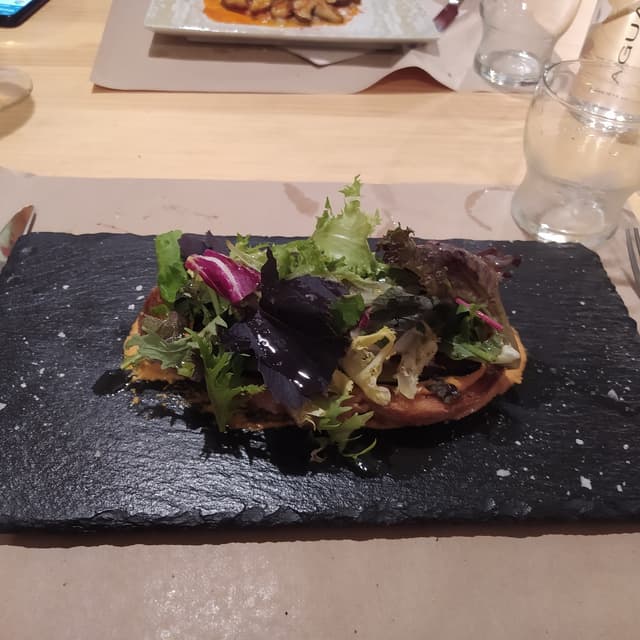 Photo du plat “Torrada berenjena y romescu”