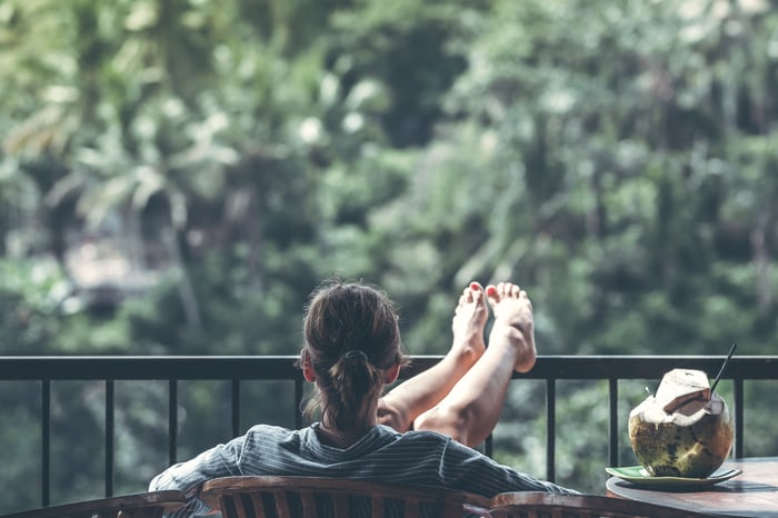 Woman relaxing on a balcony