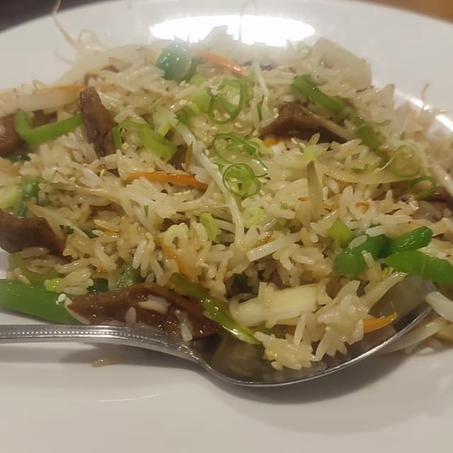 Photo of the dish “arroz con verduras y pollo vegano”