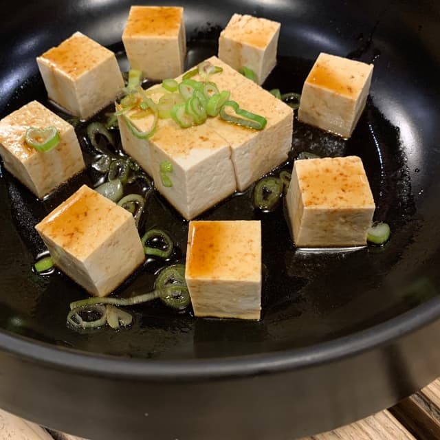 Photo of the dish “Tofu Al Naturale Con Salsa Di Soia, Cipollotti E Sesamo”