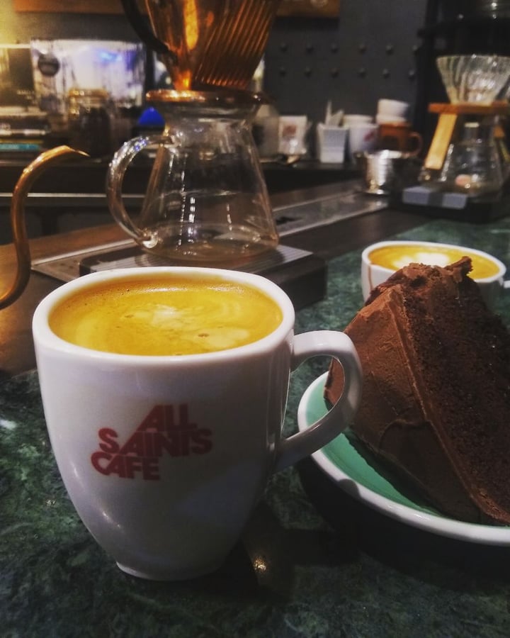 photo of All Saints Cafe Torta de chocolate y Cafe con leche de avellanas shared by @luvgn on  29 Jan 2020 - review