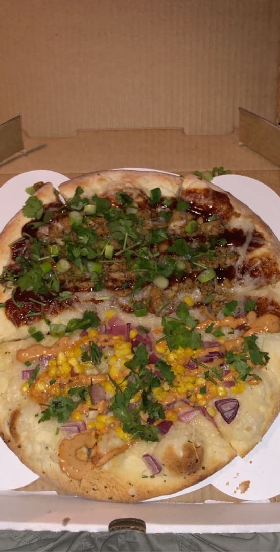 Photo of the dish “1/2 Vegan Elote Pizza & 1/2 Vegan BBQ Chik'n Pizza”