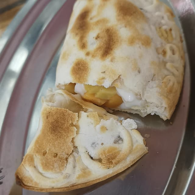 Photo of the dish “Empanada 4 Quesos”