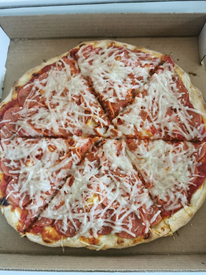review photo of Coco Vanilla Galactic Cantina Vegan pepperoni cheese pizza shared by @djmindyfresh on 01 Apr 2020 - review
