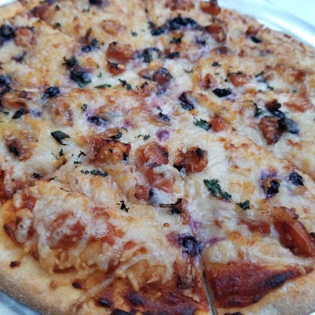 Foto do prato “Cantaloupe Flatbread”
