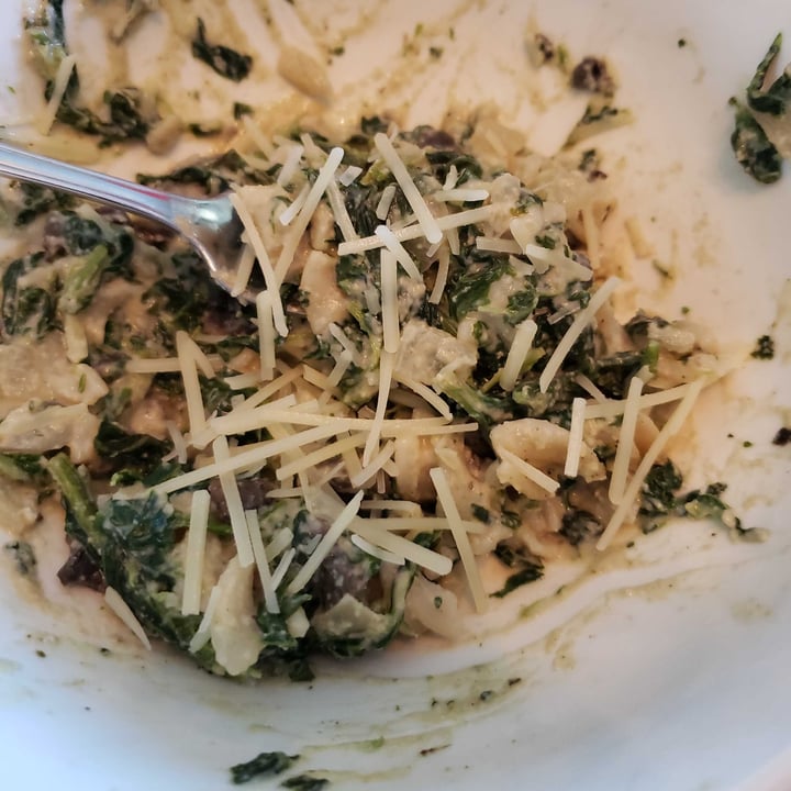review photo of Trader Joe's Dairy-free shredded parmesan cheese alternative shared by @lexiegoats on 14 May 2022 - review