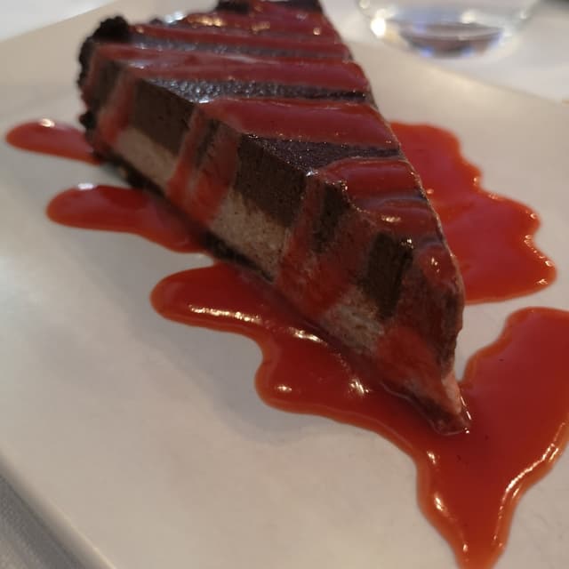 Photo of the dish “Torta crudista al cacao e fragole”