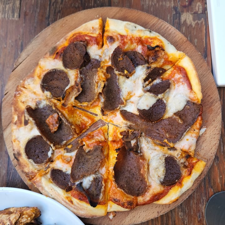 photo of Vegan Food Cartel by Veganzza meat lovers pizza shared by @andirabas on  29 Jul 2022 - review