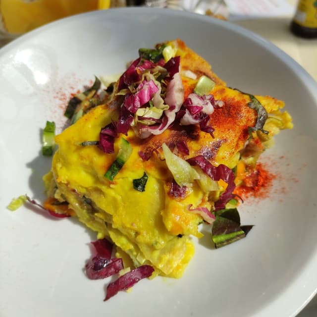 Foto do prato “Lasagne porri, radicchio e zucca”