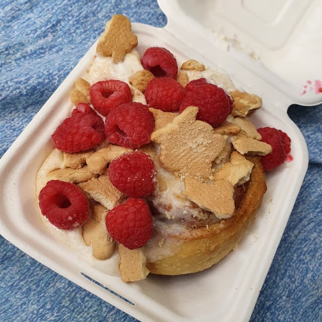 Photo of the dish “Cinnamon Roll with Cream Cheese Frosting and Raspberries & Graham”