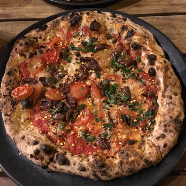 Photo of the dish “Pizza Puttanesca”
