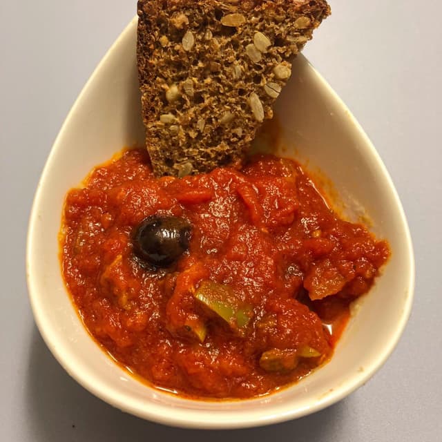Photo of the dish “Scarpetta di sugo della casa con olive”