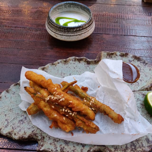 Photo of the dish “Deep fried okra fingers with coconut ranch and sesame miso sauce”