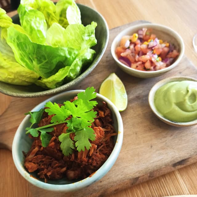 Photo of the dish “Tacos De Hojas De Cogollo Con Jackfruit, Pico de Gallo Y Crema De Aguacate”