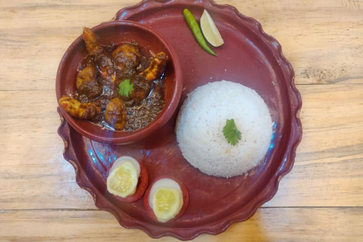 photo of Ubuntu Community - The Vegan Cafe Vegan Chingrir jhal & rice shared by @sircaragneeva on  20 Feb 2020 - review