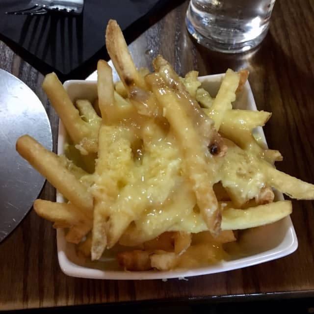 Photo of the dish “French Fries With Vegan Cheese”