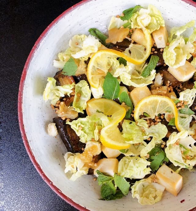 Foto do prato “Warm Eggplant Brussel Sprout Leaf Salad”