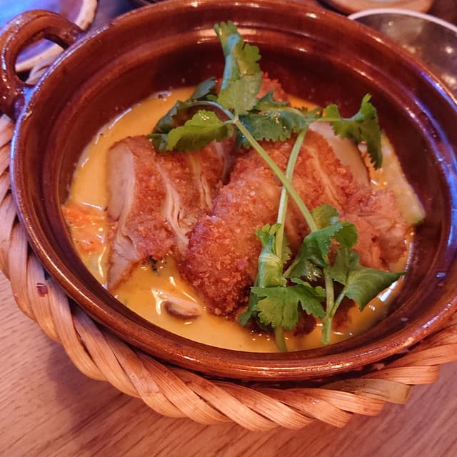 Photo of the dish “Rotes Curry im Tontopf mit "Ente"”