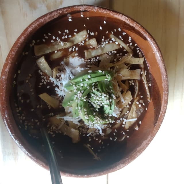 Photo of the dish ““Etlazoyonotli” sopa de frijol con chile seco y tortillas fritas”