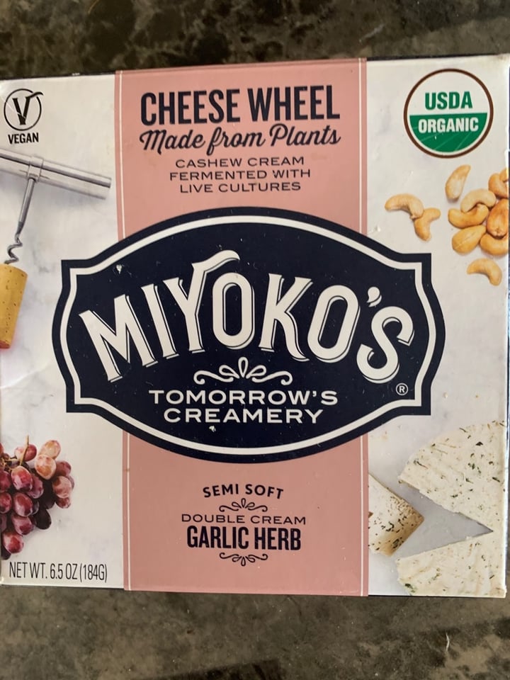 photo of Miyoko's Creamery Semi Soft Double Cream Garlic Herb Cheese Wheel shared by @ehansen on  12 Apr 2020 - review