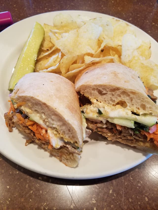 Photo of the dish “Bahn mi- Vegan Request Mock Duck, carrots cilantro, cucumbers, vegan mayo, red onion, house made vegan cheese(rinotta)”