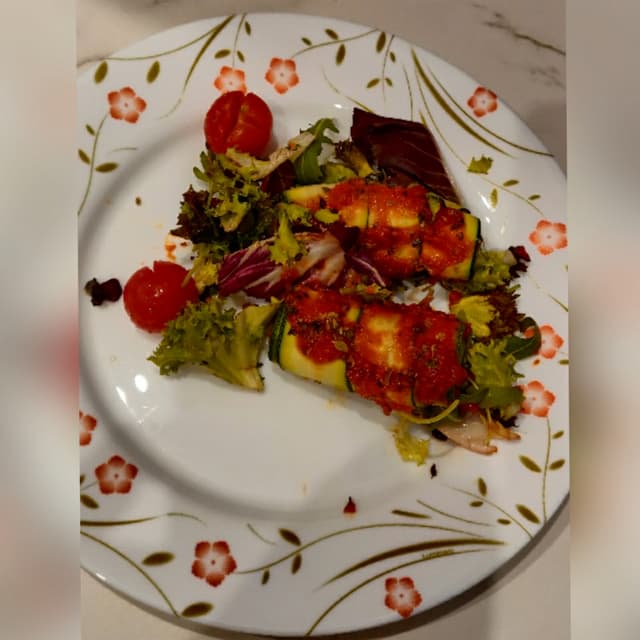 Foto del piatto “Rotllets de carbassó”