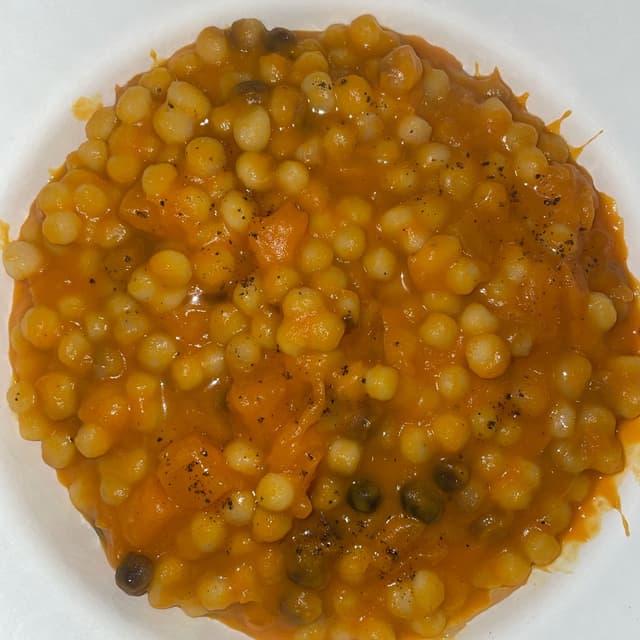 Foto del piatto “Fregola con zucca”